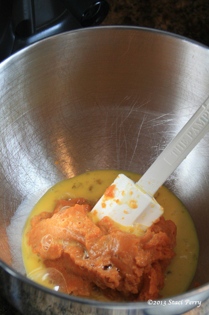 beaten eggs and pumpkin in mixing bowl 