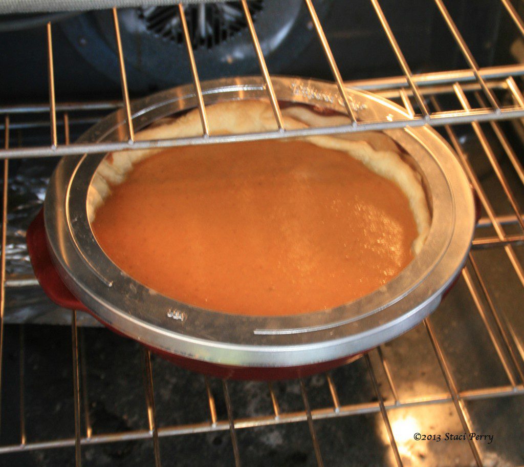 pie shield on pie crust before baking 