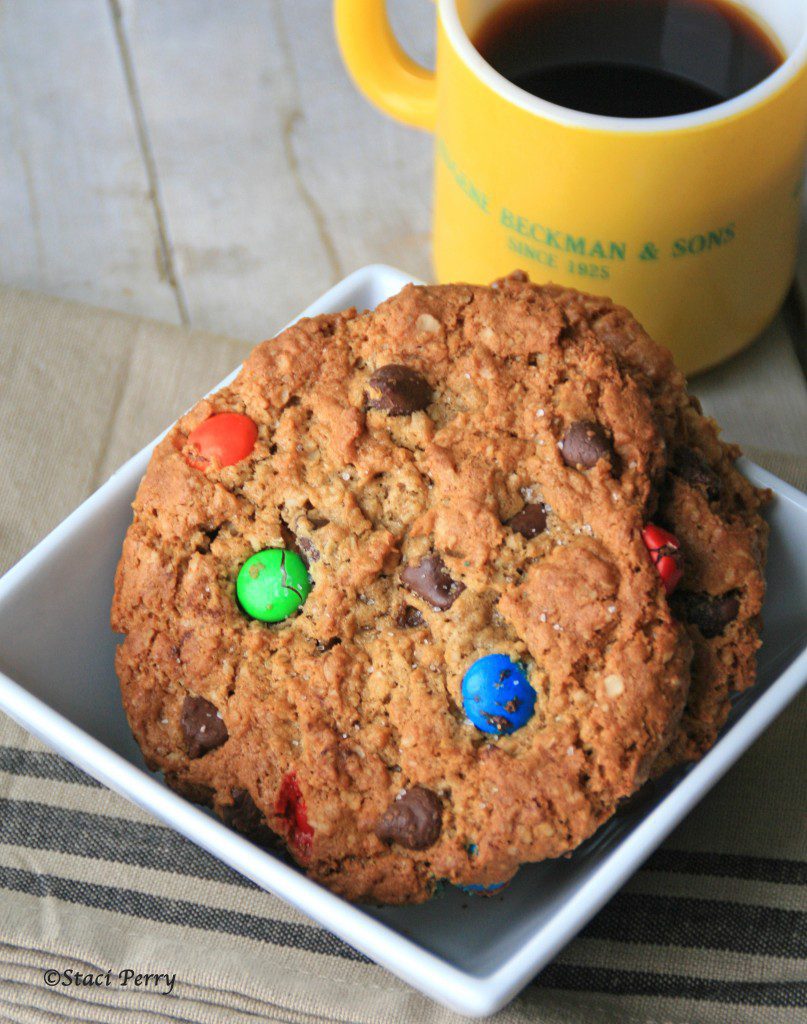 bowl of monster cookies and a cup of coffee