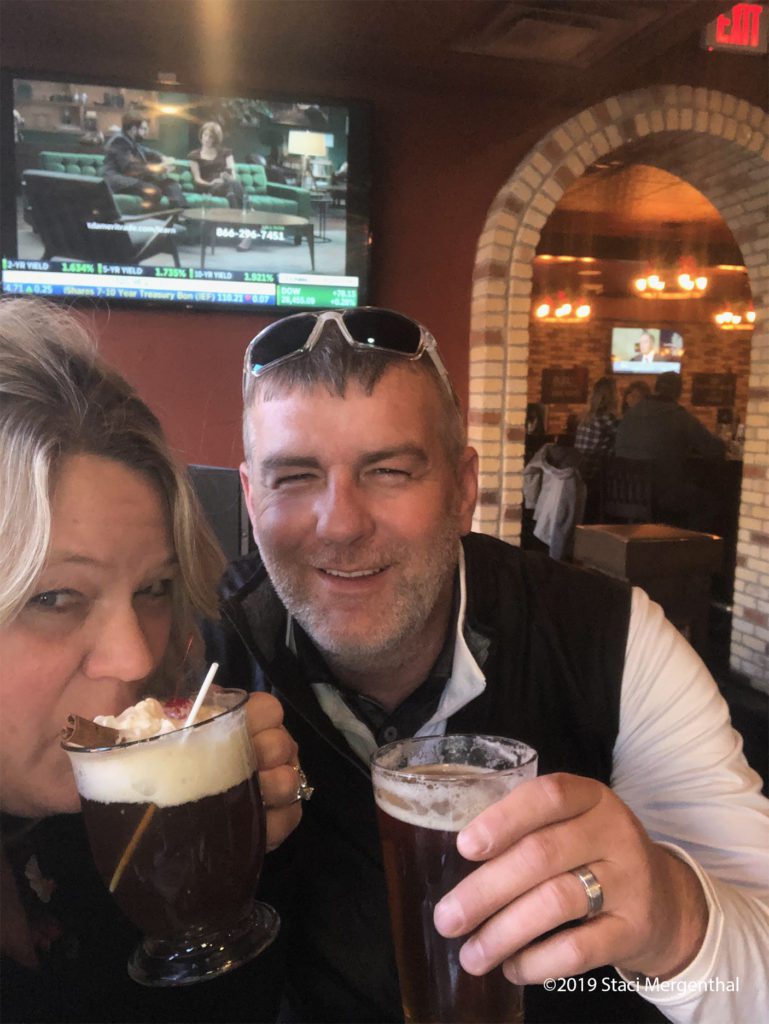Staci and Jason drinking hot apple pie and beer at Blarney Stone in Sioux Falls Sd