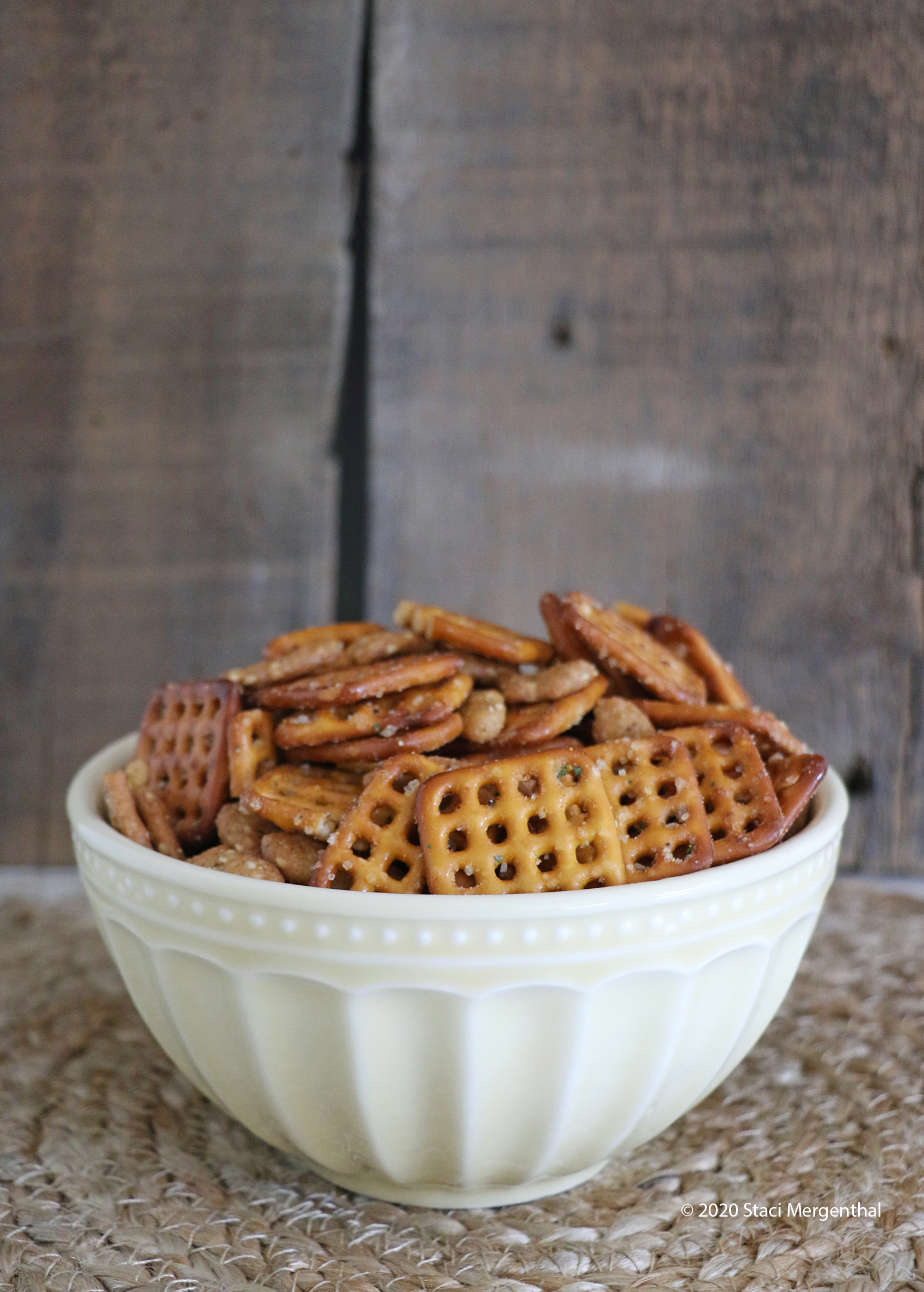 bowl of spicy pretzel snack mix