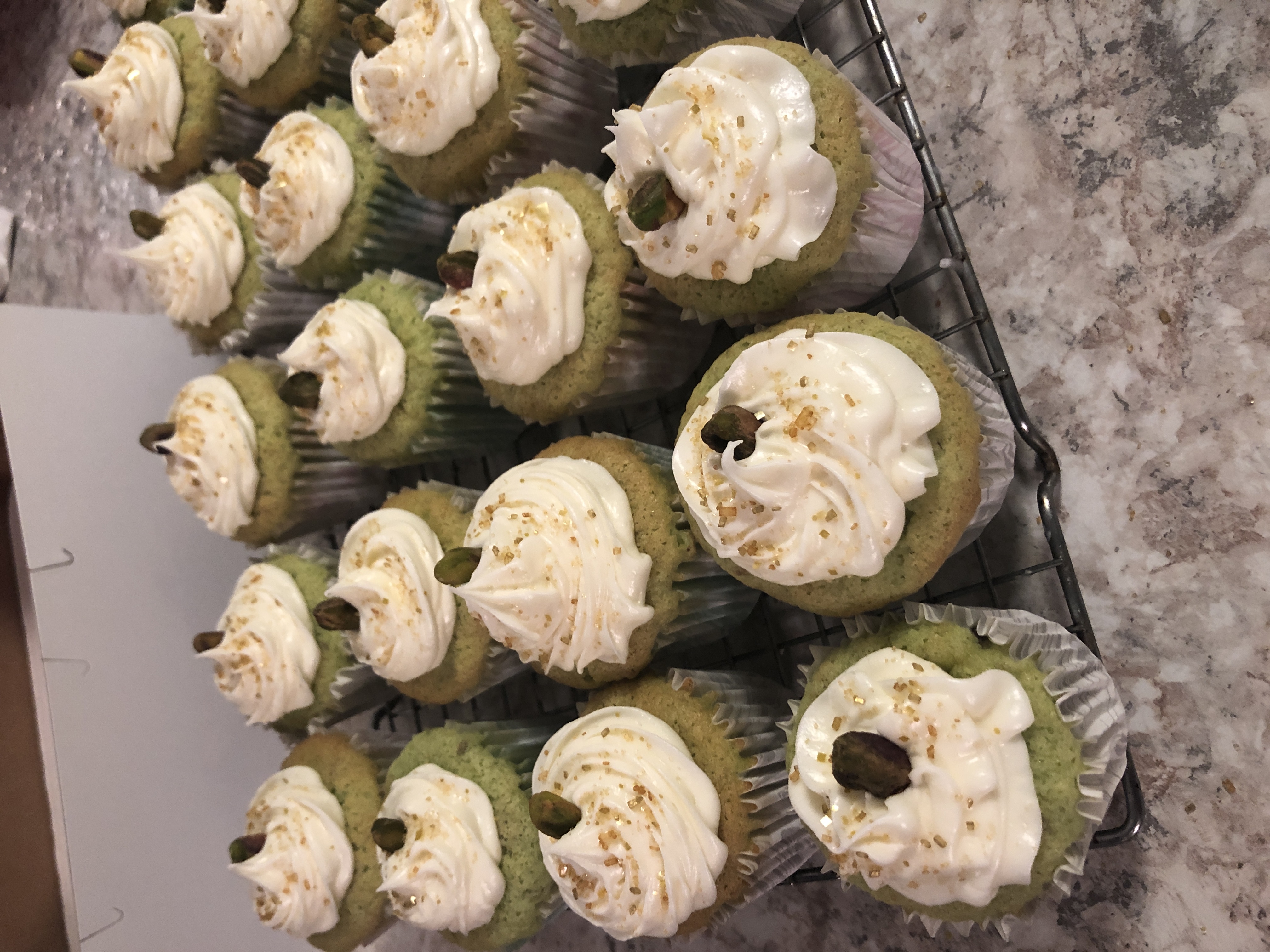 amaretto pistachio cupcakes with cream cheese white chocolate frosting