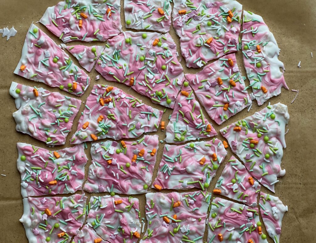 pink and white candy bark pieces with Easter bunny and carrots sprinkles 