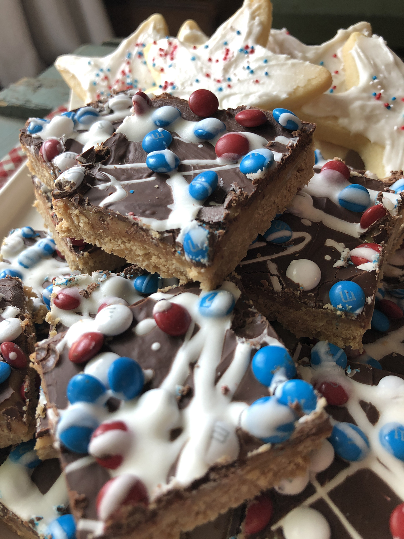 plate of red white and blue sweet bars to eat