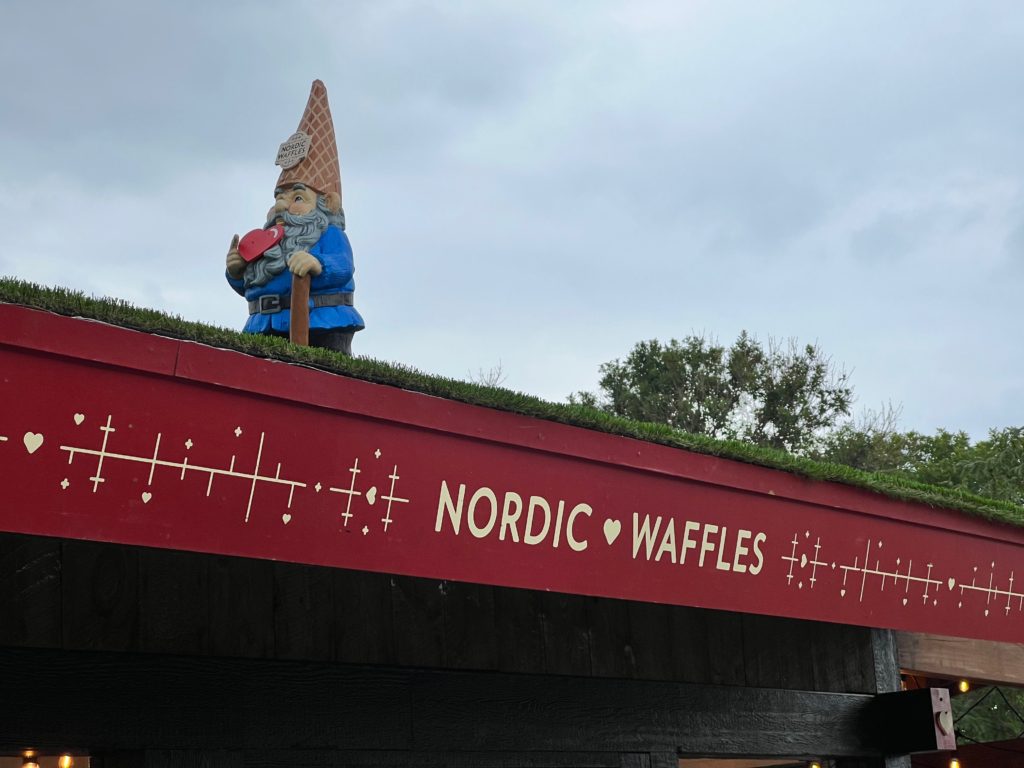 Gnorman on top of Nordic Waffles Cabin at Minnesota State Fair