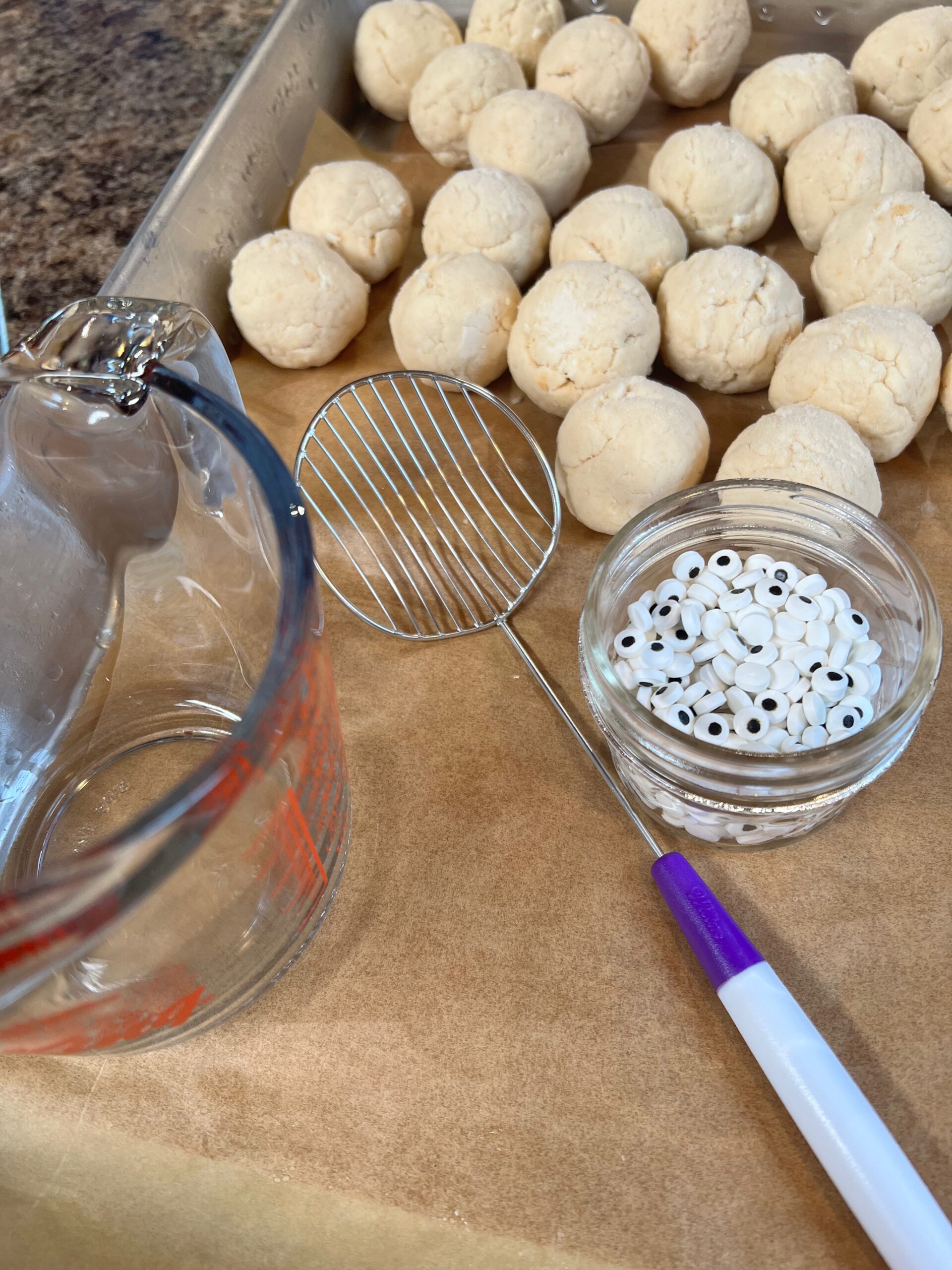 frozen cake balls on tray ready to dip