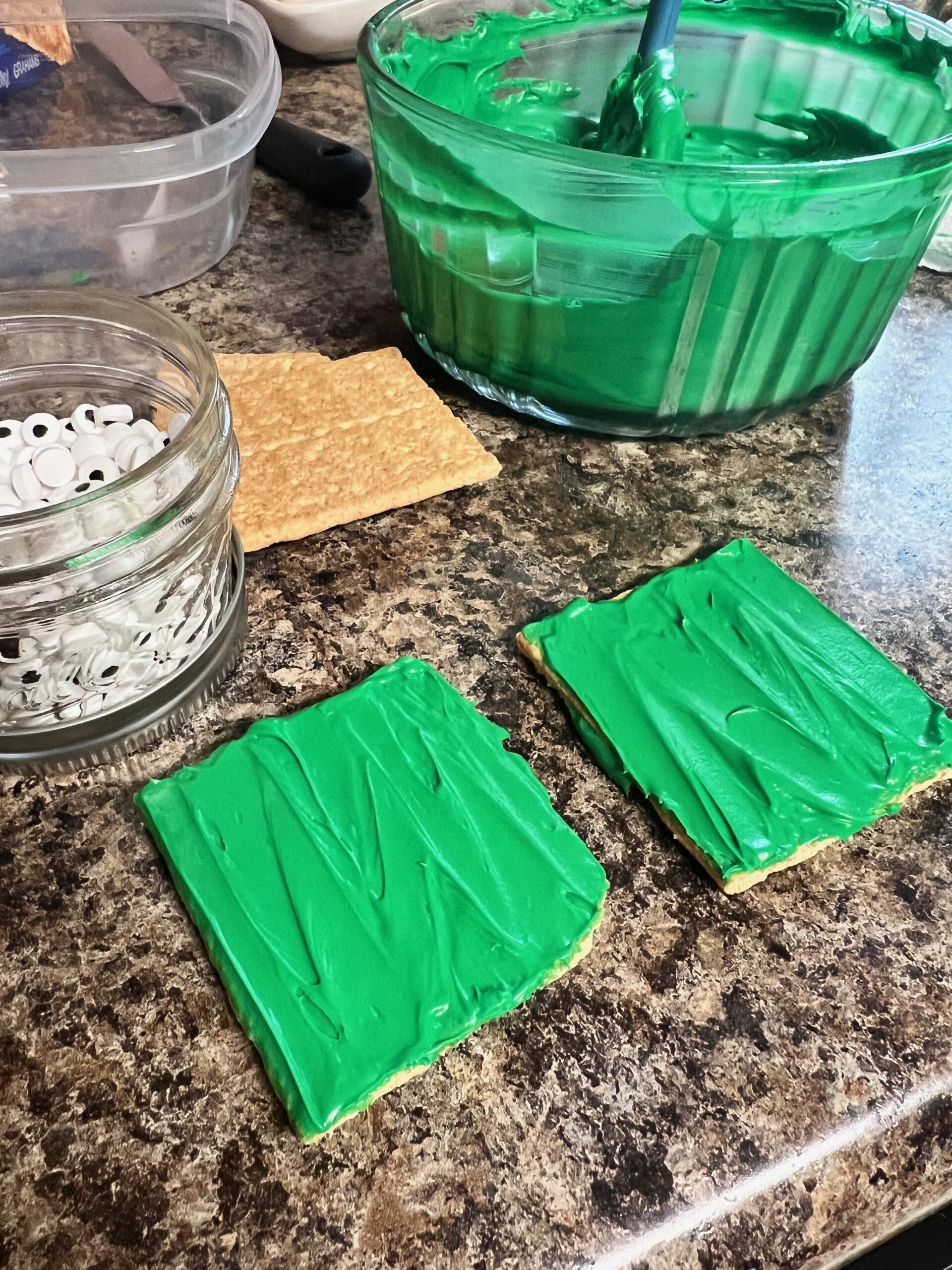 graham crackers frosted with green frosting 