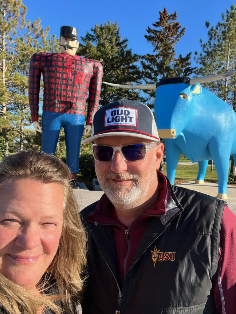 Jason and Staci at Paul Bunyan Park in Bemidji by the statues 
