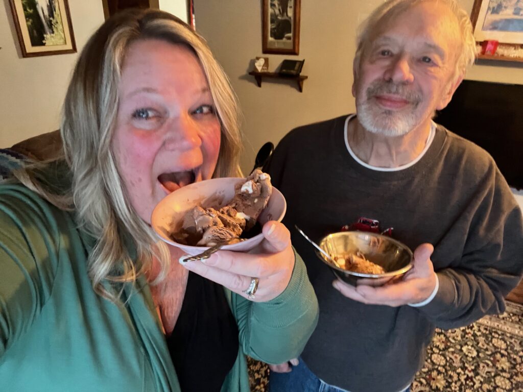 Staci and dad with homemade ice cream rocky road