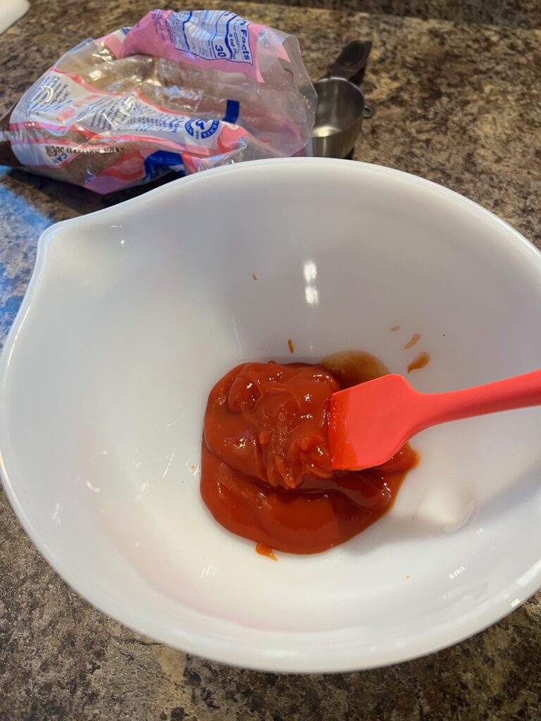 ketchup in a bowl for the meatloaf topping