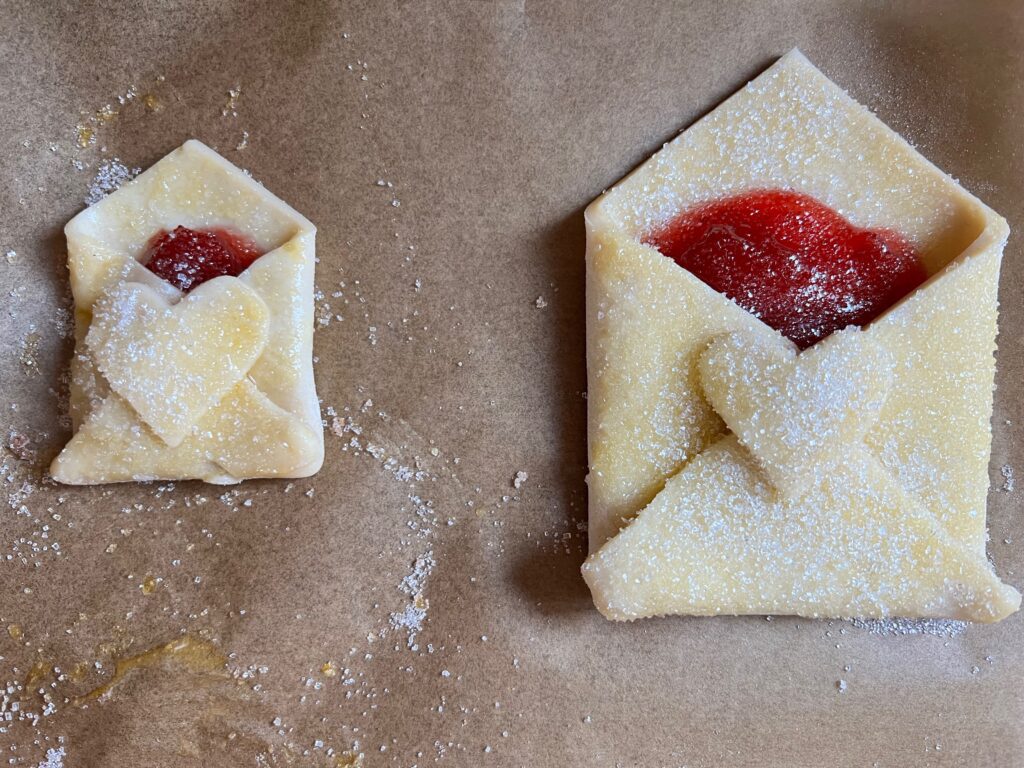 two sizes of edible love notes ready to bake