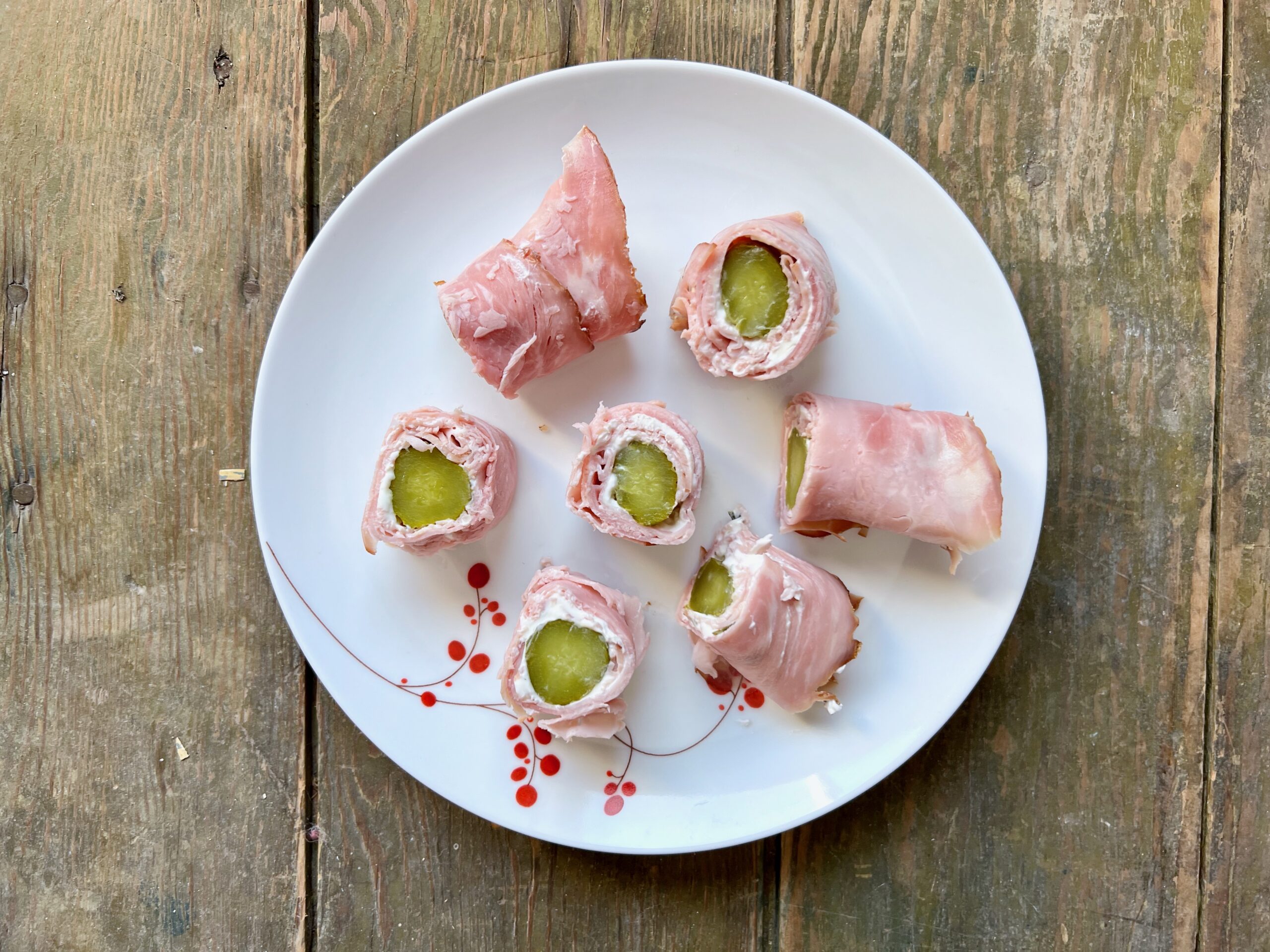 South Dakota sushi on an appetizer plate. Also called hame and pickle roll-ups