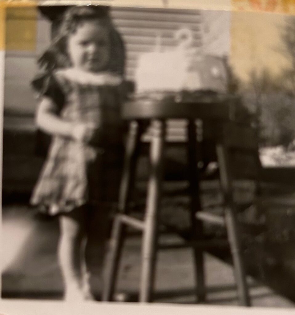 Grandma Janet with birthday cake in 1928