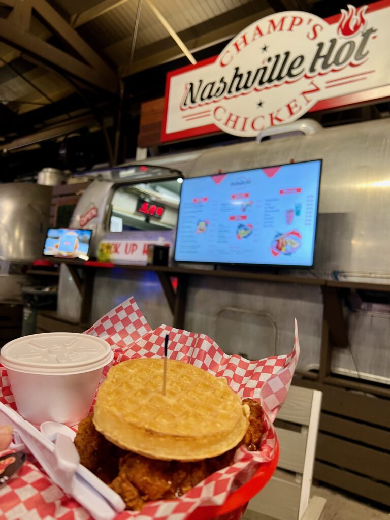 spicy fried chicken sandwich on waffles at Champ's Nashville Hot Chicken