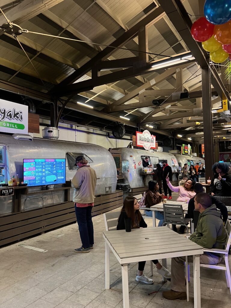 line of airstreams in the food hall at The Garden at Palafox + Main