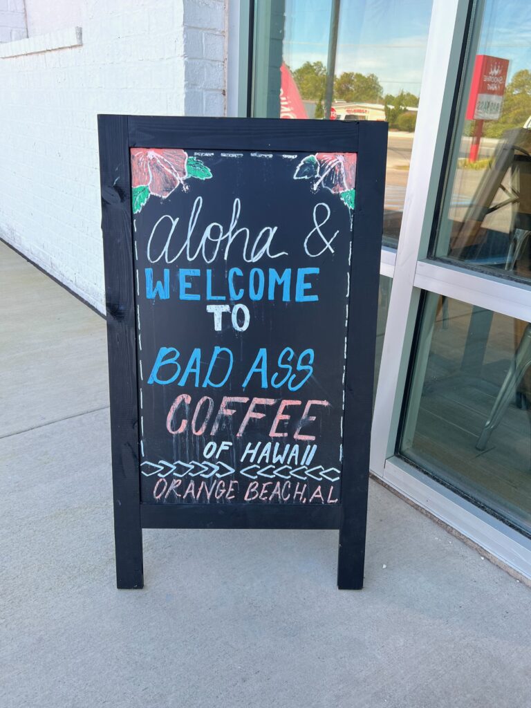 outdoor chalk sign at Bad Ass Coffee of Hawaii Orange Beach Alabama