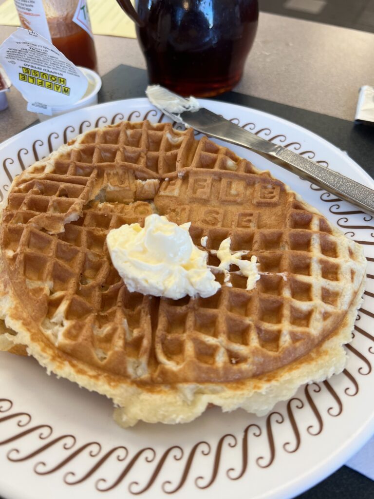 waffle on a plate with butter at a Waffle House