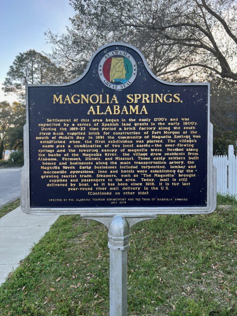 Magnolia Springs Alabama history of the town sign