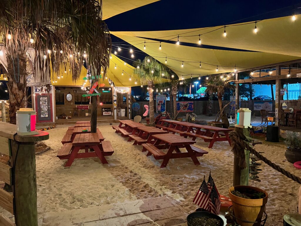 backyard entertainment area at Moe's Original BBQ Orange Beach Alabama 