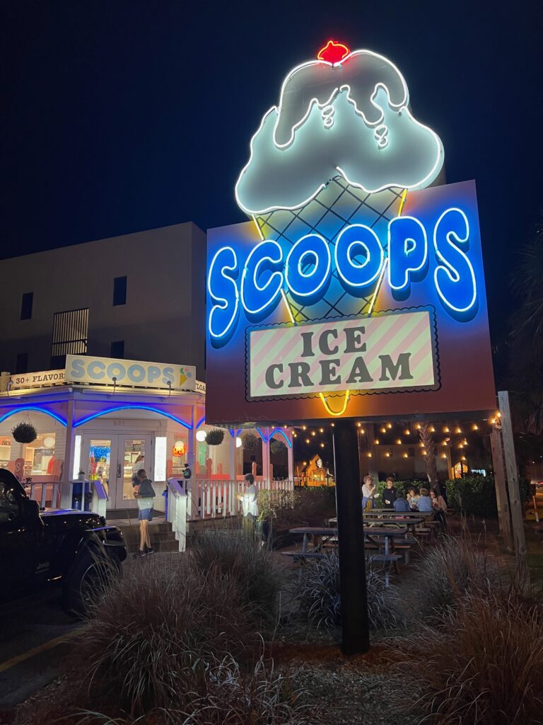 Scoops Ice Cream outdoor sign and lights at night Gulf Shores Alabama 