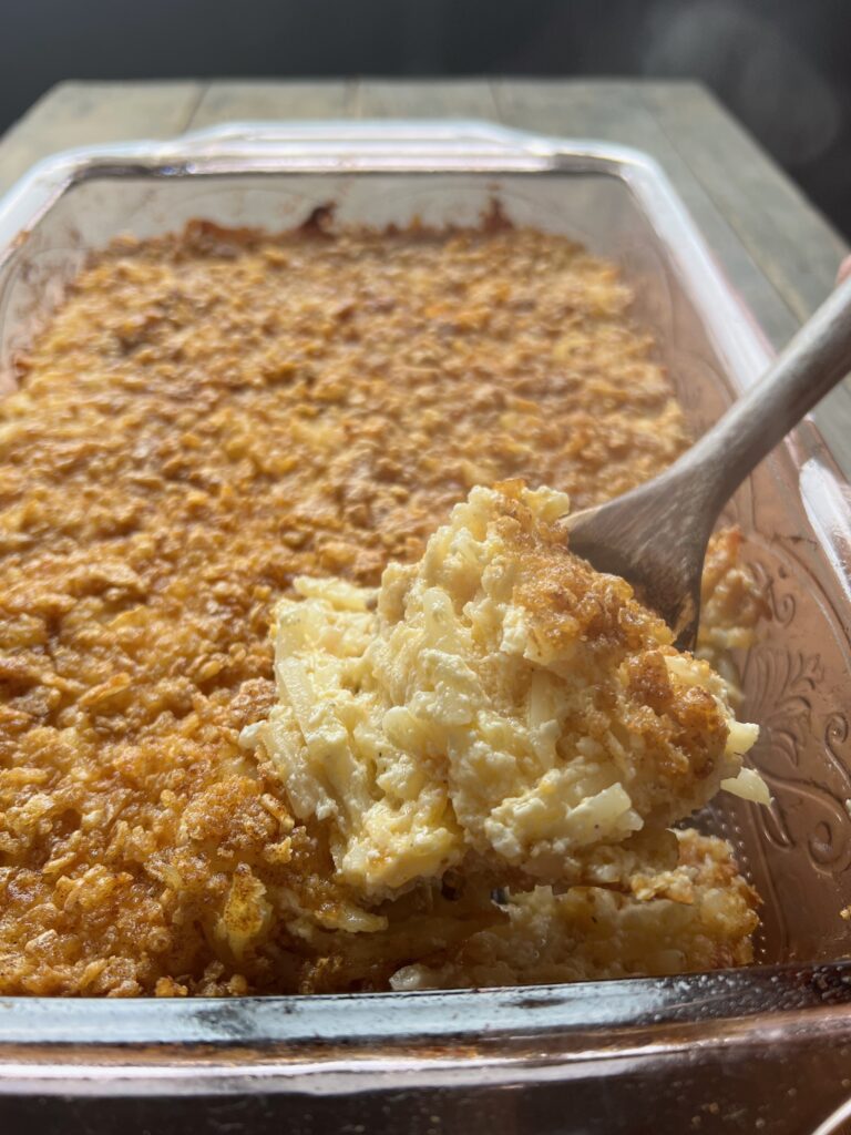 spoonful of cheesy hash brown casserole 