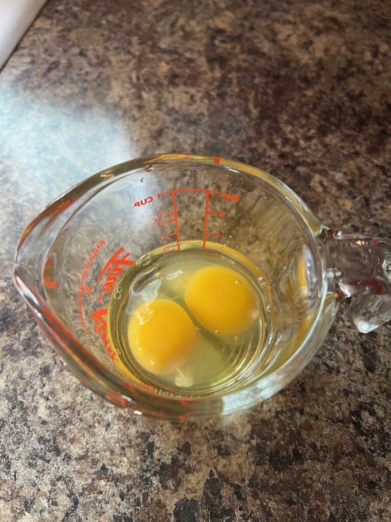 2 eggs in a measuring cup