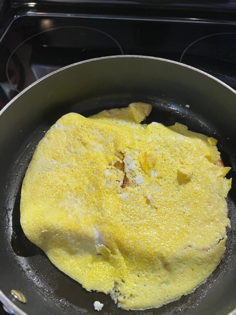 eggs and bread in a pan for one-pan breakfast
sandwiches 