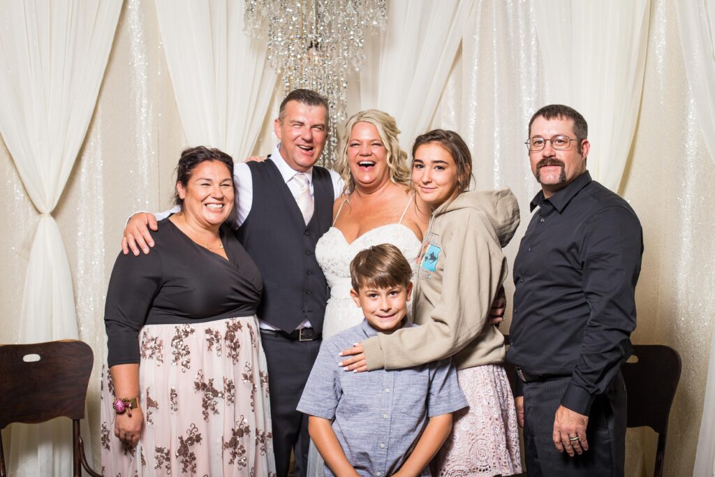 Russell and his family at Staci and Jason's wedding