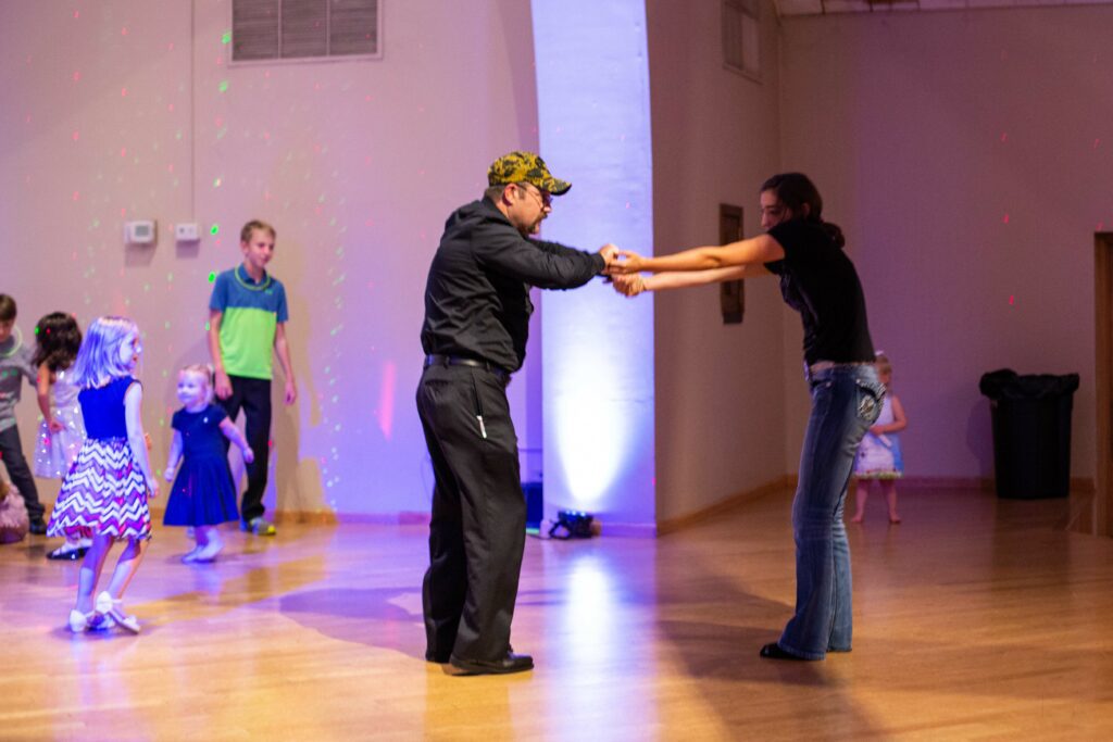 Russell dancing with his daughter Grace