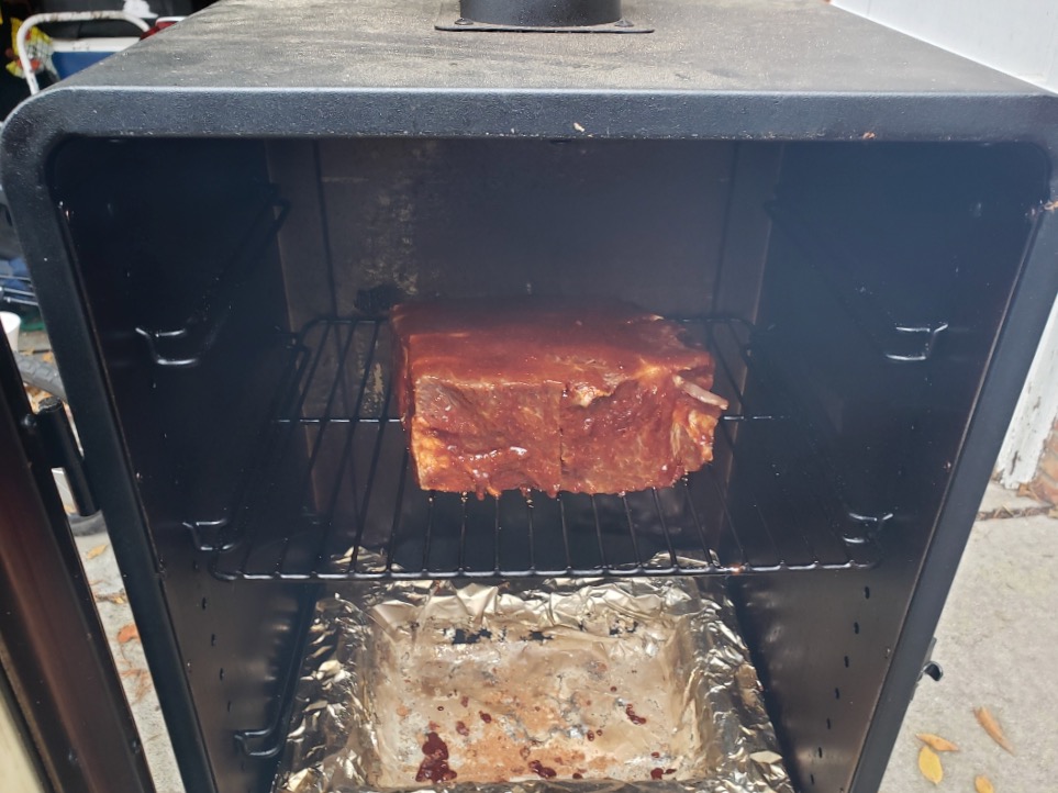 meat in smoker