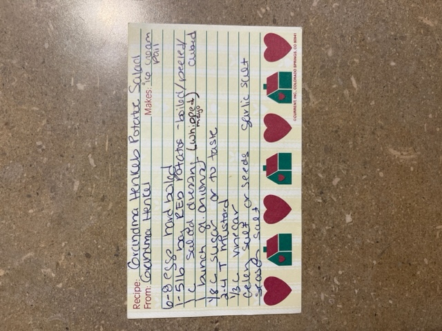 Grandma Henkel's potato salad recipe on a handwritten recipe card