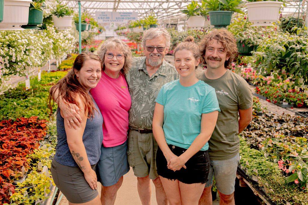 Breah Waldron, Lynn and Brian Darnall, Sarah and Micky Alfano in the greenhouse