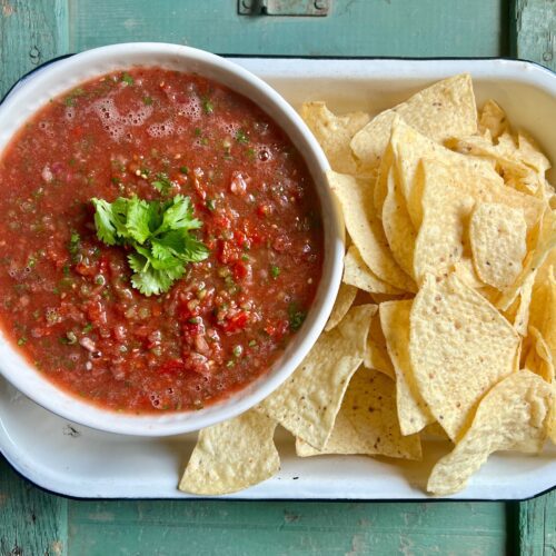 big bowl of salsa with a side of tortilla chips