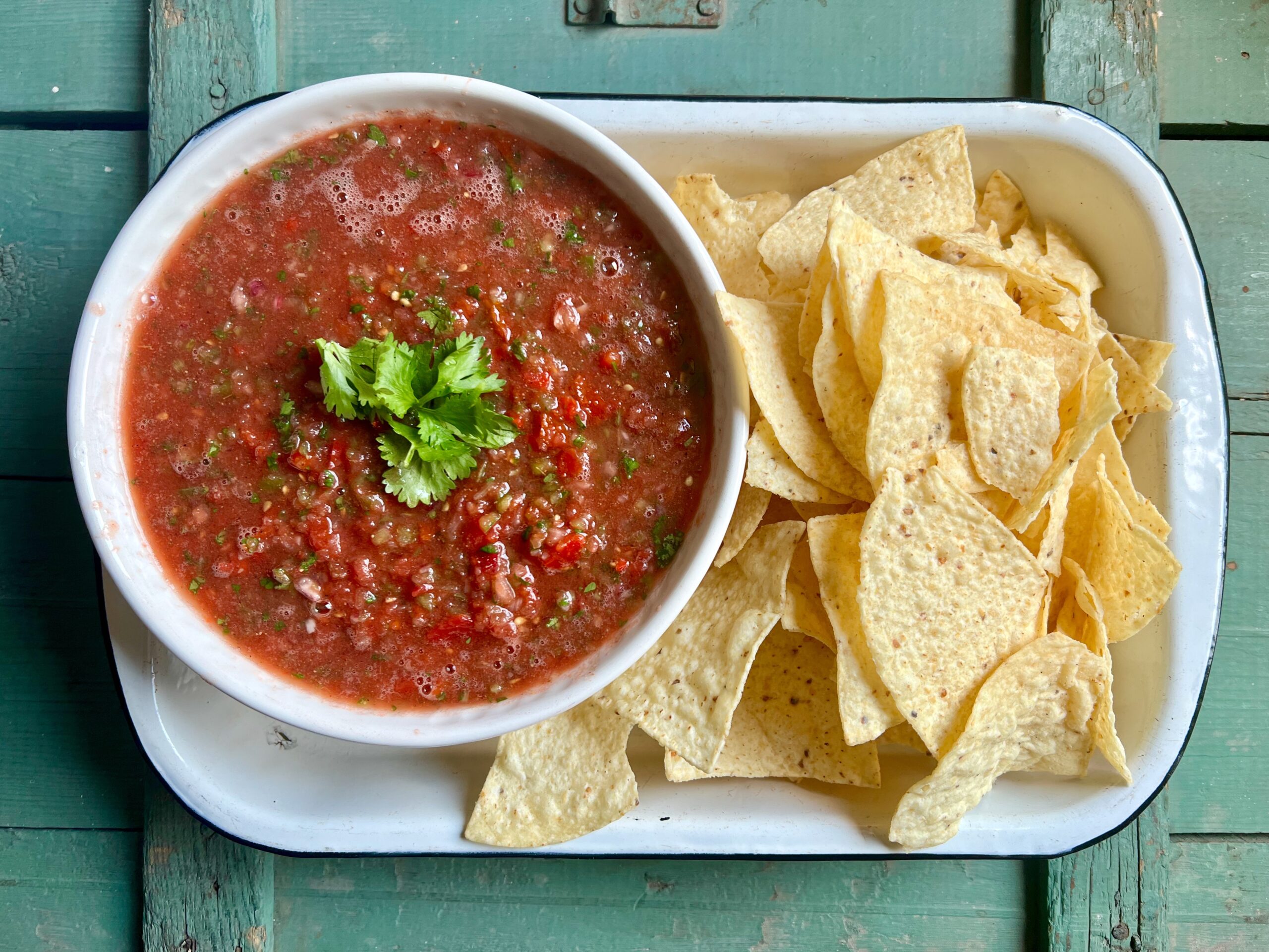 big bowl of salsa with a side of tortilla chips