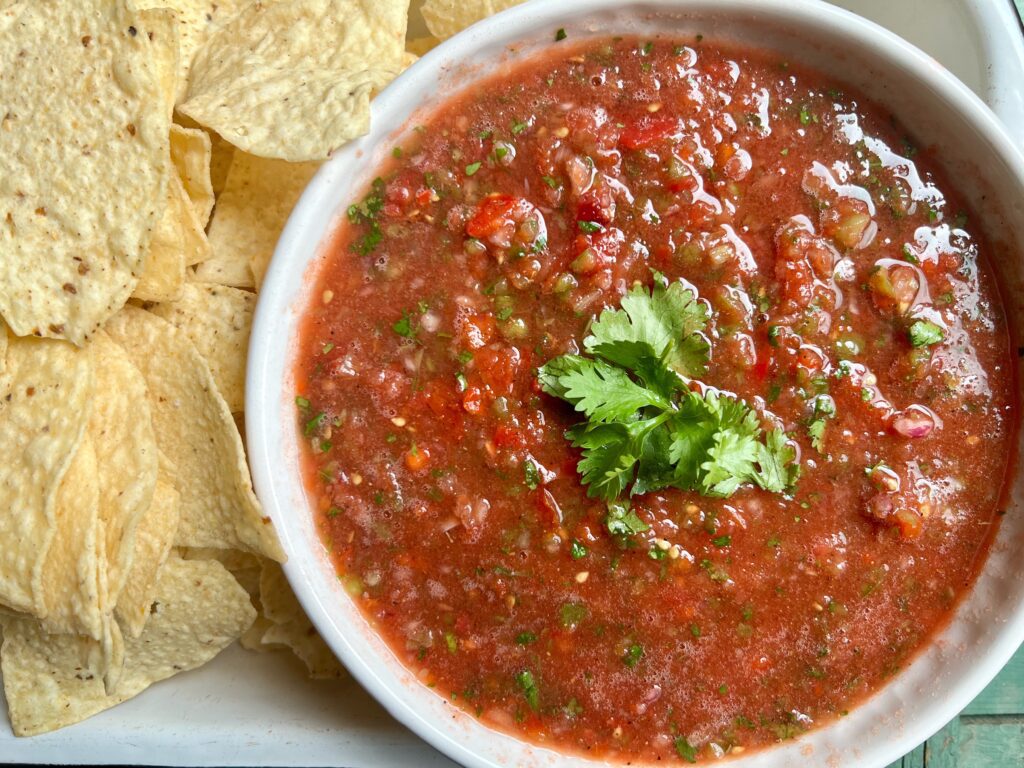 salsa in a bowl with a side of tortilla chips