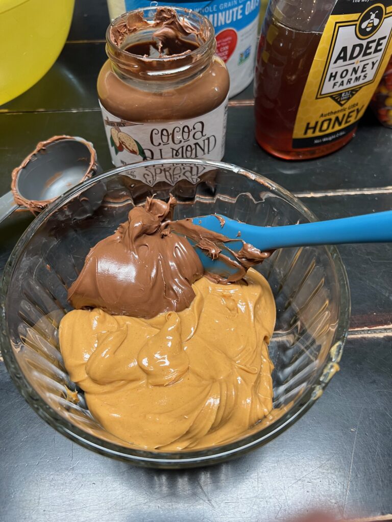peanut butter and cocoa almond spread in a bowl