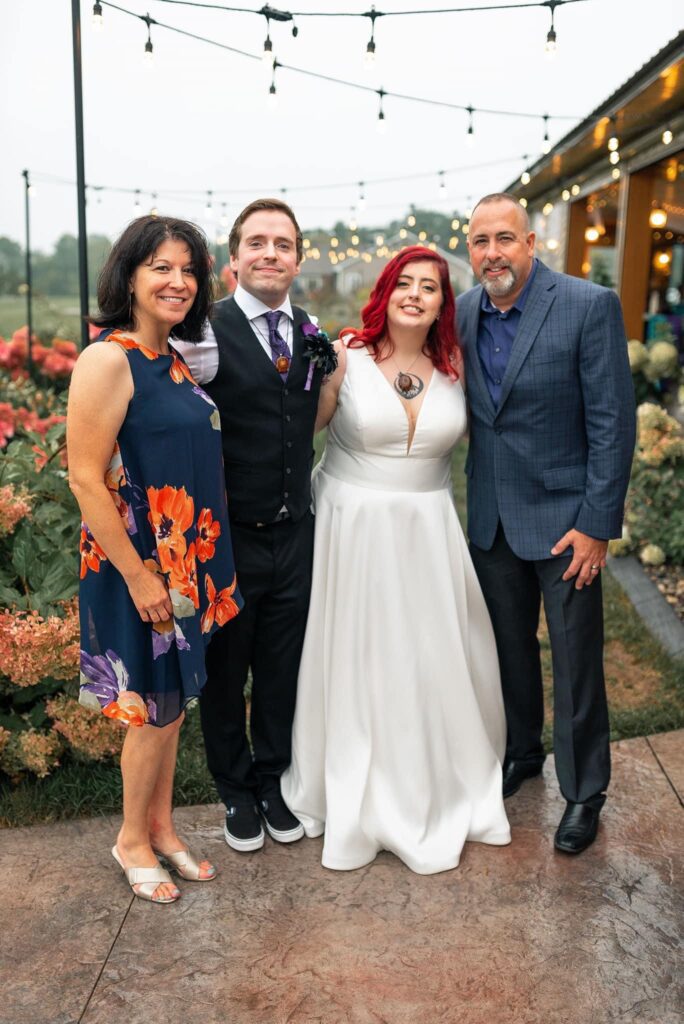 bride and groom with parents