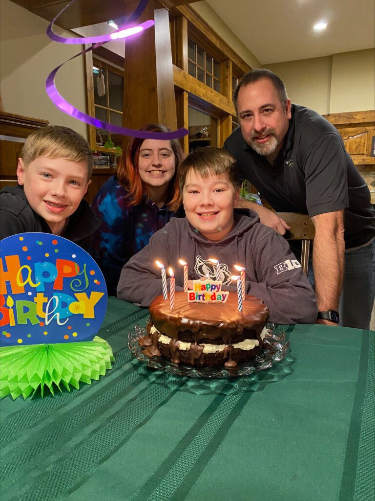 Shannon's family with Ho Ho birthday cake