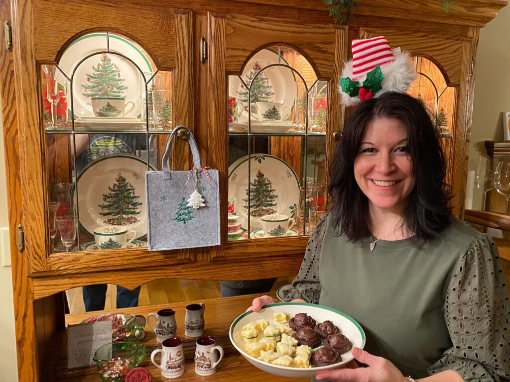 Shannon holding a plate of Christmas cookies