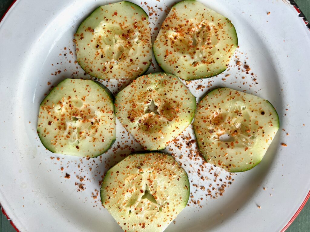 plate with tajin seasoned cucumbers