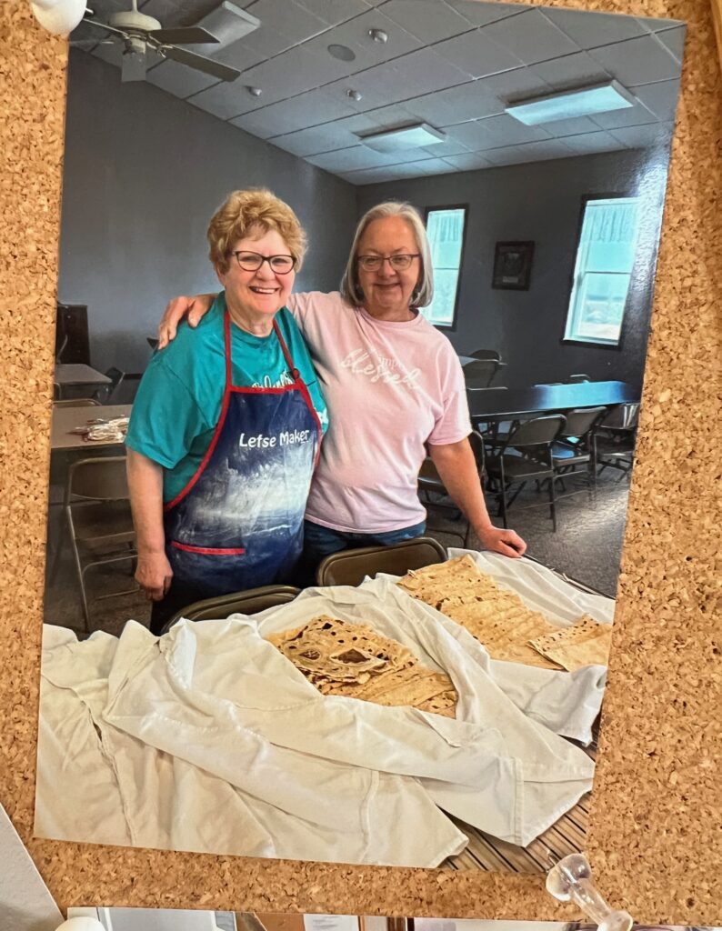 Ginny and Inga with piles of lefse for the Lake Campbell Lutheran Church Cookie Walk