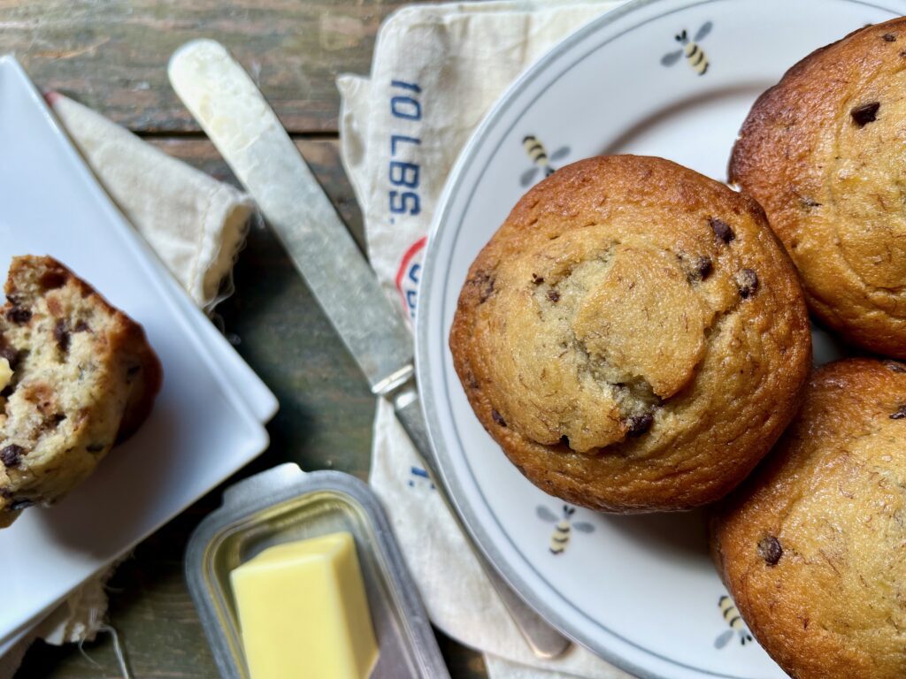 plate of banana muffins with chocolate chips