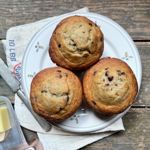 3 banana muffins with chocolate chips on a plate