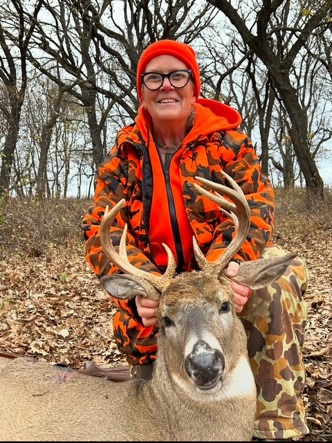 Sharon Hohler with the deer she shot
