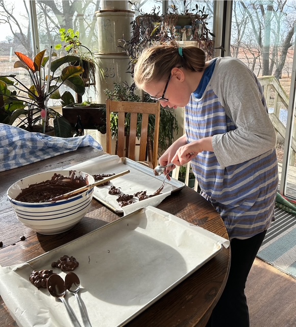 Sharon's granddaughter making peanut clusters